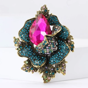 Vintage alloy rose brooch with large fuchsia teardrop gem and multicolor rhinestones