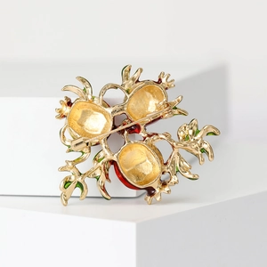 Creative enamel pomegranate brooch in red and green with golden metal back and pin clasp