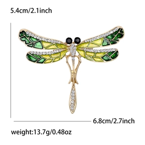 Broche libellule en émail avec strass mesurant 6,8x5,4cm en alliage métallique