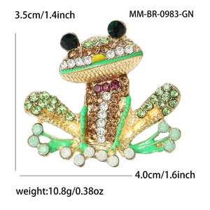 Vintage green frog brooch with sparkling crystals and golden metal base for women