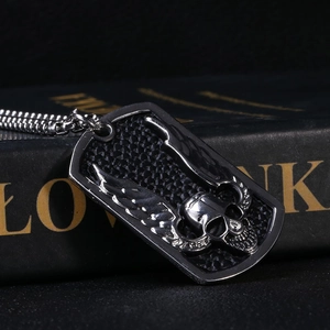 Punk style stainless steel skull wing pendant necklace with vintage embossed detailing