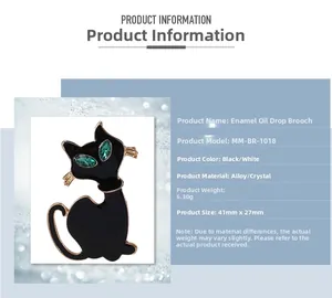 Detail van de emaille kattenbroche met afmetingen 41mm hoogte en groene strass-ogen op metaal