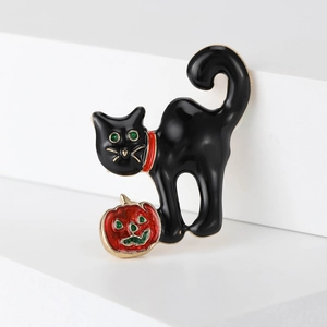 Halloween cartoon black cat with green eyes and pumpkin brooch in gold-plated alloy finish