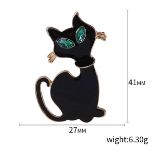 Elegante zwarte emaille kattenbroche met groene kristallen ogen en gouden rand, 41x27mm