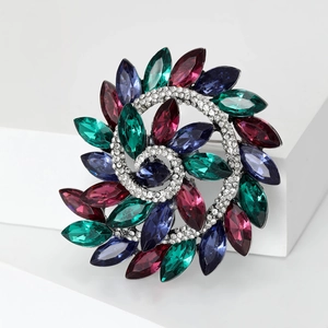 Vintage spiral floral brooch with multi-colored gemstones and sparkling rhinestones