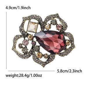 Broche retro de flor de amapola con cristales, base oro antiguo y medidas 4,9cm por 5,8cm