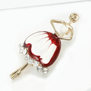 Detailed view of enamel dancing ballet girl brooch with sparkling zircon inlays