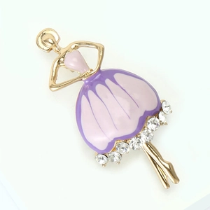 Detail of ballerina brooch with purple enamel dress and sparkling crystal accents