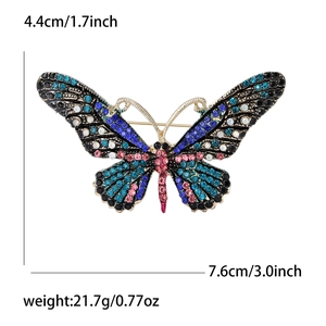 Detailed view of luxury butterfly brooch dimensions 7.6cm by 4.4cm with colorful rhinestones