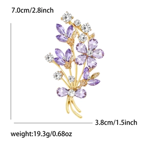 Elegant gold-plated flower bouquet brooch with purple crystals and white rhinestones