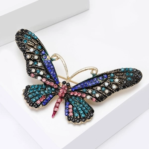 Macro detail of high-end colorful rhinestone butterfly brooch with vibrant crystals