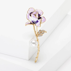 Elegant purple enamel flower brooch with gold stem, sparkling crystals and large white pearl