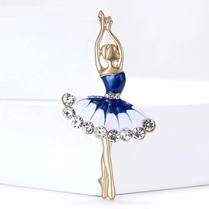 Elegant gold dancing girl brooch with blue enamel and sparkling crystal accents