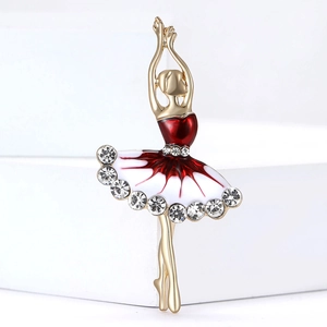 Elegant ballet dancer brooch in gold alloy with red enamel and sparkling crystals
