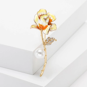 Elegant floral enamel brooch with golden stem, sparkling rhinestones and white pearl