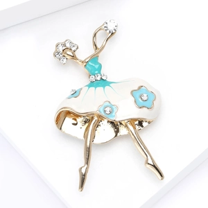 Detail view of a ballerina brooch with blue enamel dress and crystal accents