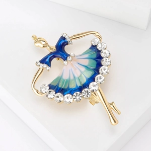 Close-up of ballet dancer brooch with blue gradient enamel and sparkling rhinestones