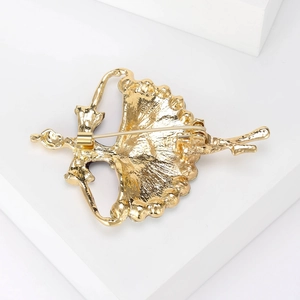 Elegant gold dancing girl brooch with premium metal finish and secure pin back closure