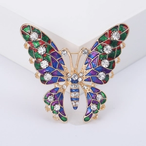 Elegant gold alloy butterfly brooch with colorful enamel wings and sparkling rhinestones