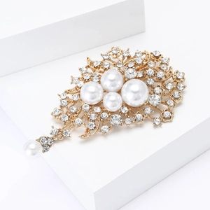 Broche vintage en alliage doré avec perles blanches et pendentif floral en strass