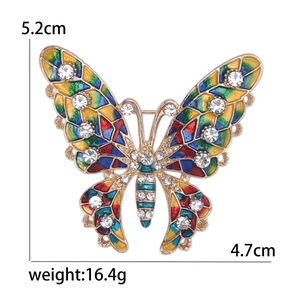Exquisite gold butterfly brooch with colorful enamel wings and crystal rhinestones