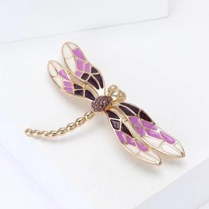 Broche libellule exquise en alliage doré avec strass violets et ailes en émail coloré