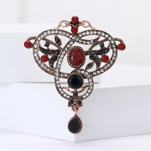 Vintage palace style rose gold brooch with red and blue crystals and rhinestones