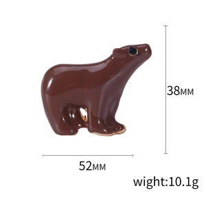 Cute brown enamel polar bear brooch pin with dimensions 52mm by 38mm on white background