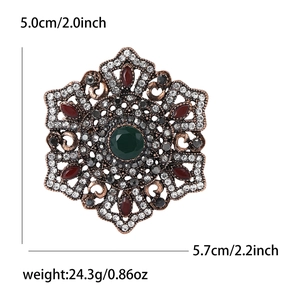 Vintage Baroque alloy brooch with green gemstone and red rhinestones, 5.0cm height