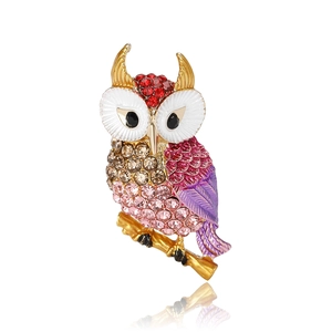 Chic golden owl brooch with colorful rhinestones on a branch for suits and coats