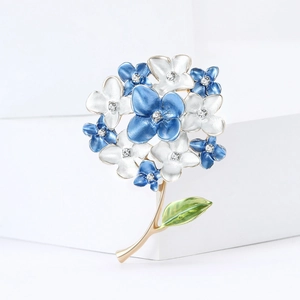 Elegant blue hydrangea flower brooch with enamel petals and crystal centers on a gold stem