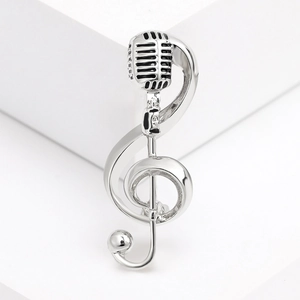 Silver musical note brooch with treble clef and vintage microphone design for women