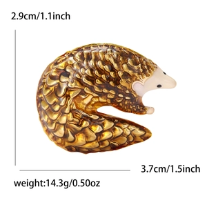 Golden enamel pangolin brooch with realistic scale texture for fashion accessories