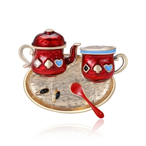 Creative enamel tea set brooch featuring a red teapot and golden tray on white background