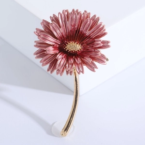 Detailed close-up of multi-layer pink gradient flower brooch with golden stem
