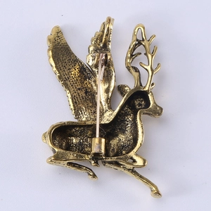 Back view of luxury vintage gold flying elk brooch pin with secure metal clasp detail