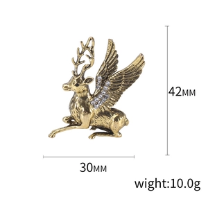 Luxury gold winged deer brooch with sparkling white rhinestones and dimensions shown