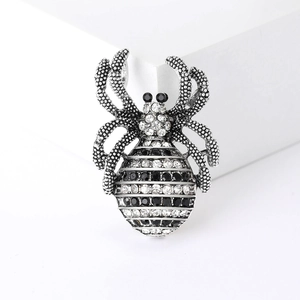 Gothic punk spider brooch with black and white rhinestones on silver metal base