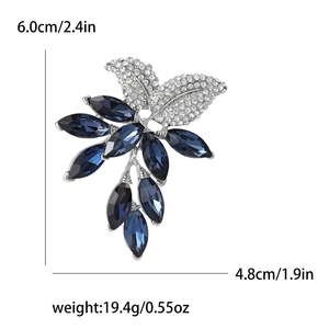 Elegant flower brooch with dark blue marquise crystal and sparkling rhinestone leaves