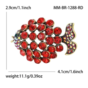 Elegant hollow goldfish brooch with red rhinestones and gold base, size 4.1x2.9cm