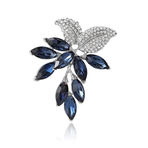 Elegant floral leaf brooch with blue marquise crystals and clear white zircon stones