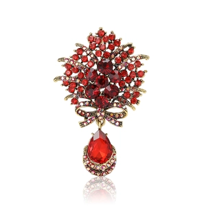 Élégante broche bouquet de cristaux rouges vintage avec pendentif poire et fini bronze