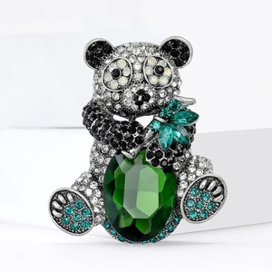 Exquisite panda brooch set with sparkling crystals and a large green gemstone