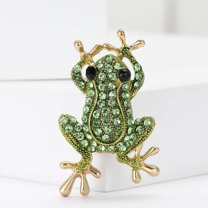 Charmante broche grenouille en strass verts et alliage doré pour costumes et pulls