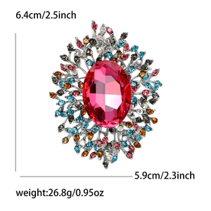 Detailed view of luxury flower brooch dimensions: 6.4cm height with ruby crystal center
