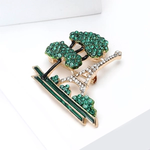 Eiffel Tower brooch with green enamel rhinestones in gold finish for sweaters