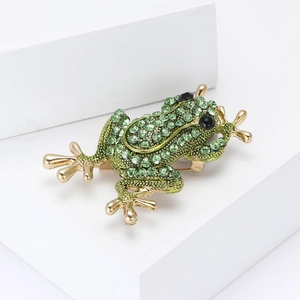 Broche grenouille dorée exquise avec strass verts pour costumes et chandails fins