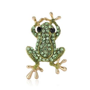 Broche grenouille dorée exquise ornée de strass verts et de touches de gemmes noires