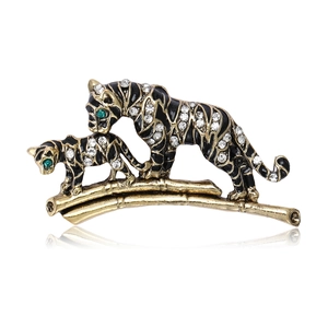 Vintage gold leopard brooch with mother and child design on bamboo branch and crystals