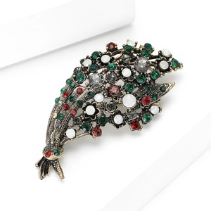 Vintage bouquet rhinestone brooch with antique gold finish and colorful crystals